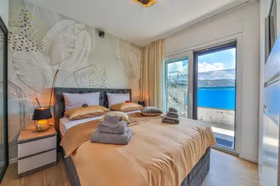 Krevet ili kreveti u jedinici u objektu Sky Pool Penthouse with a huge heated private pool
