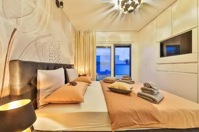 Krevet ili kreveti u jedinici u objektu Sky Pool Penthouse with a huge heated private pool