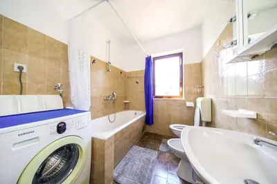 Kupaonica u objektu Apartments with a parking space Postira, Brac - 742