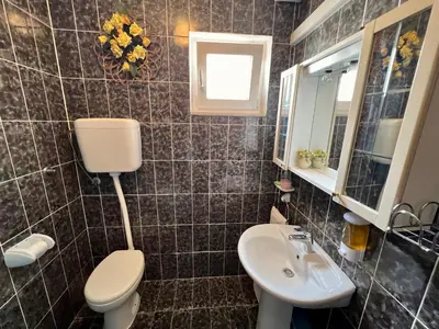 Kupaonica u objektu Apartment near the beach DRAGA