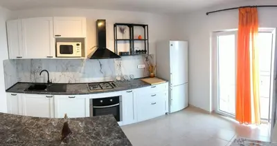 Kuhinja ili čajna kuhinja u objektu Apartman None
