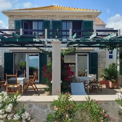 Apartments by the sea Povlja