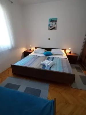 Krevet ili kreveti u jedinici u objektu Apartments by the sea Duce, Omis - 2731
