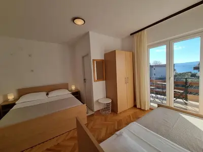 Krevet ili kreveti u jedinici u objektu Apartments by the sea Duce, Omis - 2821