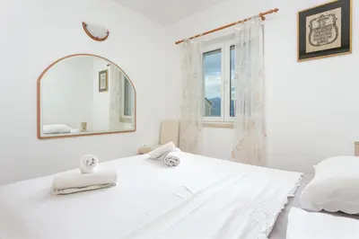 Krevet ili kreveti u jedinici u objektu Apartment Postira 2948b