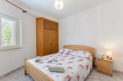 Krevet ili kreveti u jedinici u objektu Apartments by the sea Sumartin - Brac - 2952