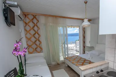Krevet ili kreveti u jedinici u objektu Apartments by the sea Duce, Omis - 2992