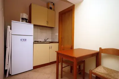 Kuhinja ili čajna kuhinja u objektu Apartments by the sea Duce, Omis - 4852