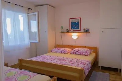 Krevet ili kreveti u jedinici u objektu Apartments by the sea Stomorska, Solta - 5190