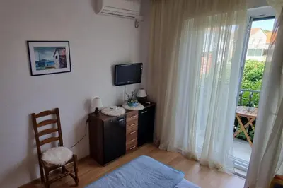 TV i/ili zabavni centar u objektu Triple Room Supetar 5658b
