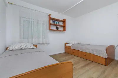Krevet ili kreveti u jedinici u objektu Apartments with parking space Omis - 5988