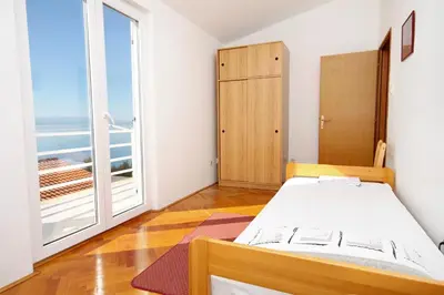 Krevet ili kreveti u jedinici u objektu Apartments with a parking space Baska Voda, Makarska - 6057