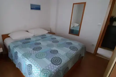 Krevet ili kreveti u jedinici u objektu Apartments with parking space Makarska - 6850