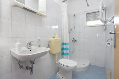 Kupaonica u objektu Apartments with a parking space Mali Rat (Omis) - 7482