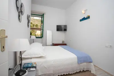 Krevet ili kreveti u jedinici u objektu Family friendly seaside apartments Duce - Omis - 8668