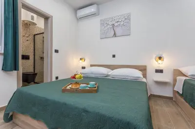 Krevet ili kreveti u jedinici u objektu Apartments by the sea Cove Zastupac, Hvar - 8761