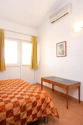 Krevet ili kreveti u jedinici u objektu Apartment Baska Voda 10027a