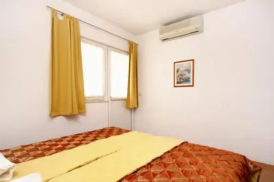 Krevet ili kreveti u jedinici u objektu Apartment Baska Voda 10027c