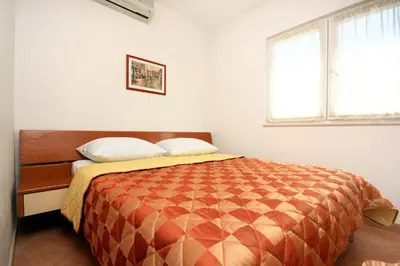 Krevet ili kreveti u jedinici u objektu Apartment Baska Voda 10027d