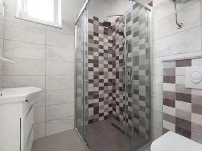 Kupaonica u objektu Studio Lončar-2 by Interhome