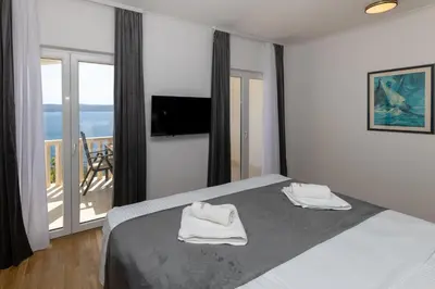 Krevet ili kreveti u jedinici u objektu Apartmani LIKI