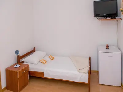 Krevet ili kreveti u jedinici u objektu Apartments Anita-Triple room with terrace