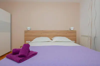 Krevet ili kreveti u jedinici u objektu Apartments Radeljić