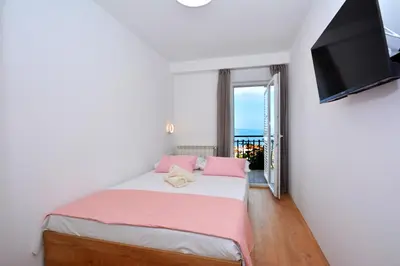 Krevet ili kreveti u jedinici u objektu Apartments Radeljić