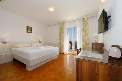 Krevet ili kreveti u jedinici u objektu Apartmens Villa Antonio 88