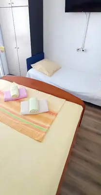 Krevet ili kreveti u jedinici u objektu Apartmani Makarska 15