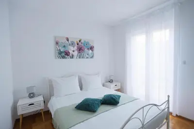 Krevet ili kreveti u jedinici u objektu Grand Apartment Mirela