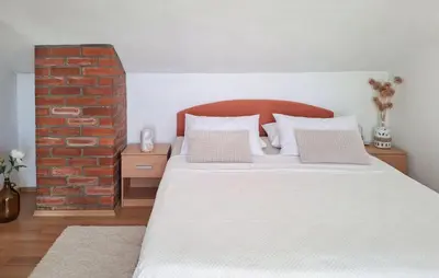 Krevet ili kreveti u jedinici u objektu Three-Bedroom Holiday Home With Sea View In Praznica