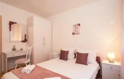 Krevet ili kreveti u jedinici u objektu Three-Bedroom Apartment In Dugi Rat