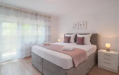 Krevet ili kreveti u jedinici u objektu Three-Bedroom Apartment In Dugi Rat