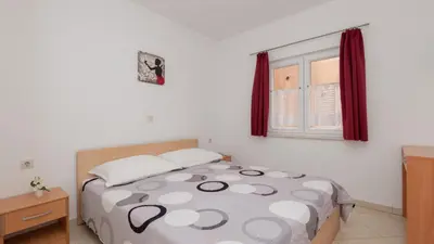 Krevet ili kreveti u jedinici u objektu Apartman Erstic 1 - Baska Voda by Villas Guide