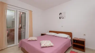 Krevet ili kreveti u jedinici u objektu Apartman Erstic 3 - Baska Voda by Villas Guide