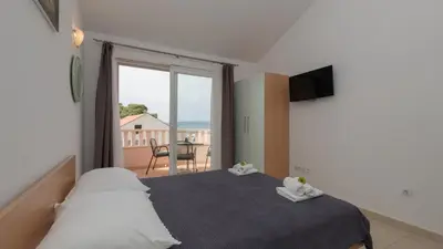 Krevet ili kreveti u jedinici u objektu Studio Apartman Erstic 6 - Baska Voda by Villas Guide