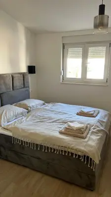 Krevet ili kreveti u jedinici u objektu Luxury Penthouse Jakov
