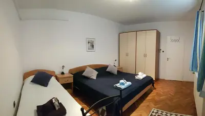 Krevet ili kreveti u jedinici u objektu Villa Radoš - 4 Sterne, 3 Apartments für maximal 18 Gäste