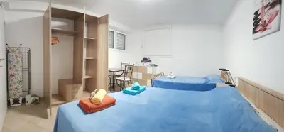 Krevet ili kreveti u jedinici u objektu Villa Radoš - 4 Sterne, 3 Apartments für maximal 18 Gäste