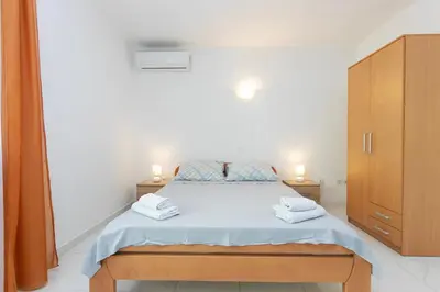 Krevet ili kreveti u jedinici u objektu Apartmani Makarska 19