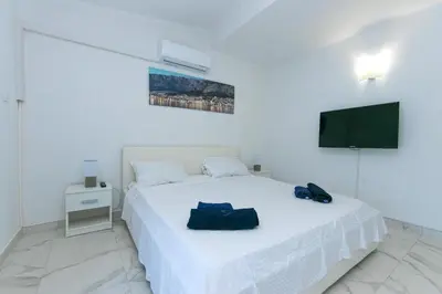 Krevet ili kreveti u jedinici u objektu Apartmani Makarska 19