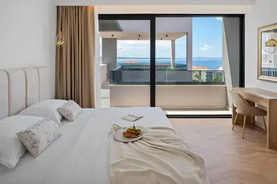 Krevet ili kreveti u jedinici u objektu Villa Pavuza Luxury 4-Bedroom Seaview Villa