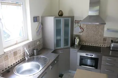 Kuhinja ili čajna kuhinja u objektu Apartments Serenity