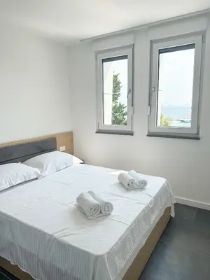 Krevet ili kreveti u jedinici u objektu Central Baška Voda Apartments