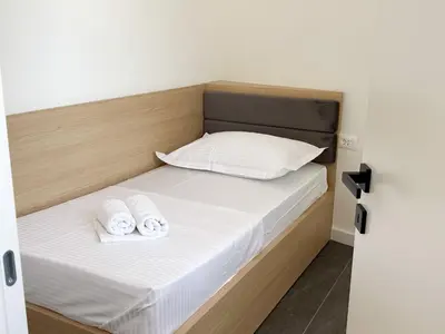Krevet ili kreveti u jedinici u objektu Central Baška Voda Apartments