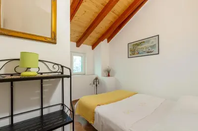 Krevet ili kreveti u jedinici u objektu Renovated Old Stone House