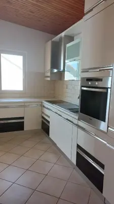 Kuhinja ili čajna kuhinja u objektu Podstrana Sea View Apartments