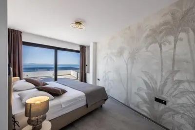 Krevet ili kreveti u jedinici u objektu Seaside Villa Leonis - Gym, Sauna and a pool