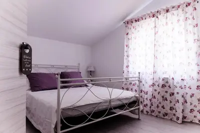 Krevet ili kreveti u jedinici u objektu Lara Rose apartment shared pool